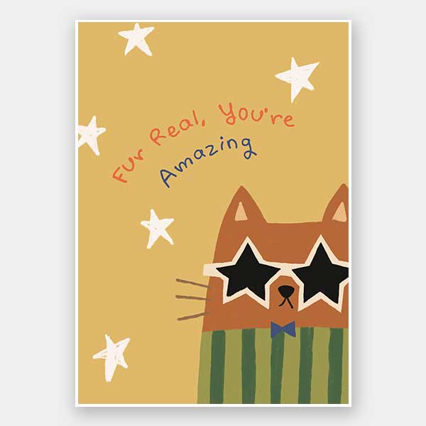 Cheeky cat in star sunglasses with the message “Fur real, you’re amazing” on a sunny yellow ground, from the Little Tails Collection by Urban Road.