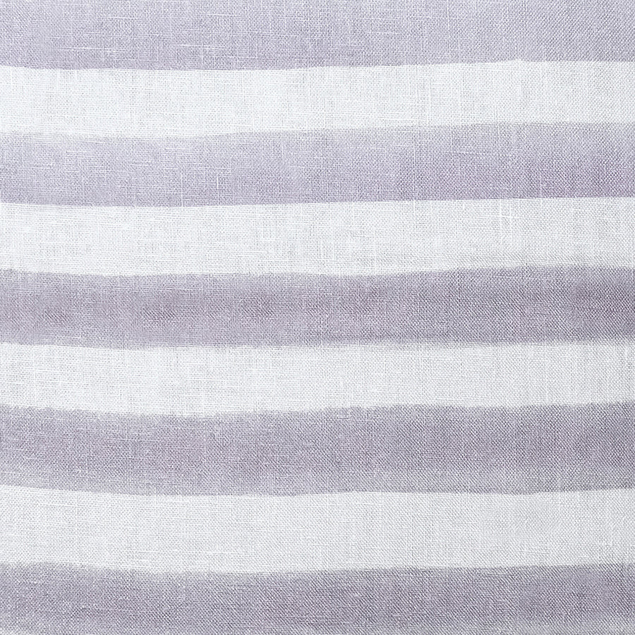 The Urban Road Rumi Striped Lilac Linen Cushion (50x50cm) features soft lilac and white stripes, a smooth linen texture, and a minimalist design—perfect for bringing understated elegance to your home decor.