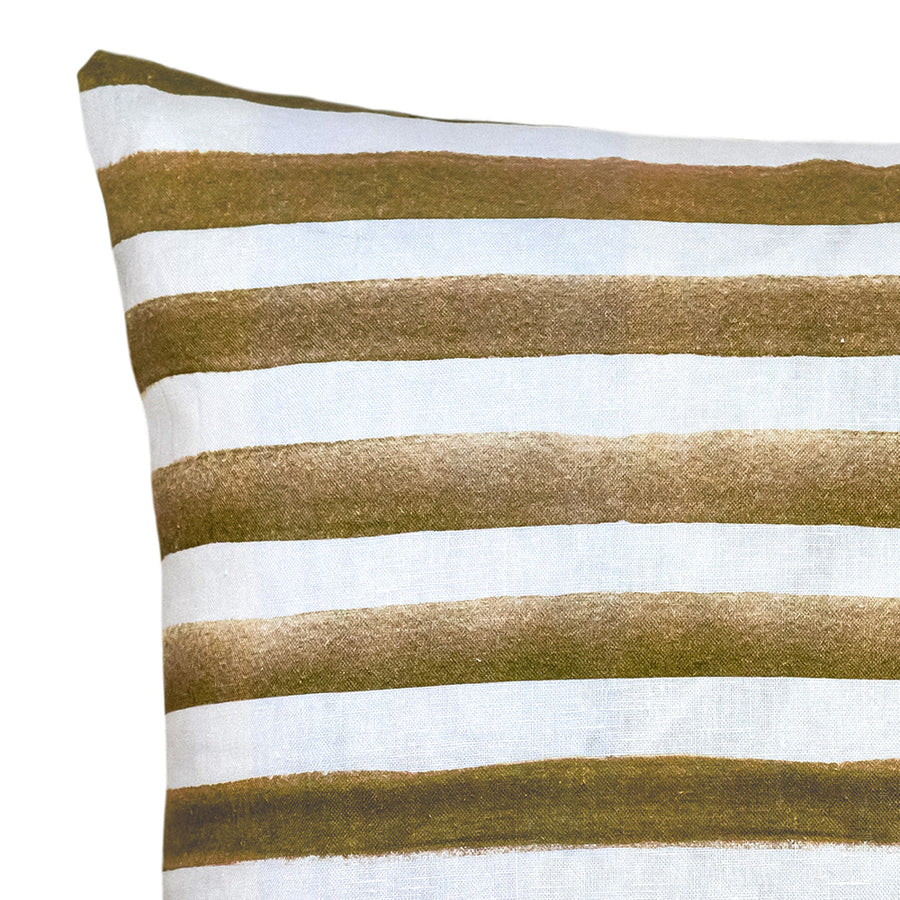 The Rumi Striped Olive Green Linen Cushion by Urban Road (50x50cm) features watercolor-style horizontal olive green and brownish-gold stripes with white, giving it a hand-painted Scandinavian look, shown on a white background.