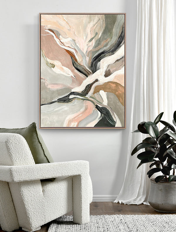 A modern living room with a textured white armchair, a green pillow, a leafy plant in a white pot, and Urban Road's "Warm Memories II" oak box frame canvas (90x120) hanging on the wall near sheer white curtains.