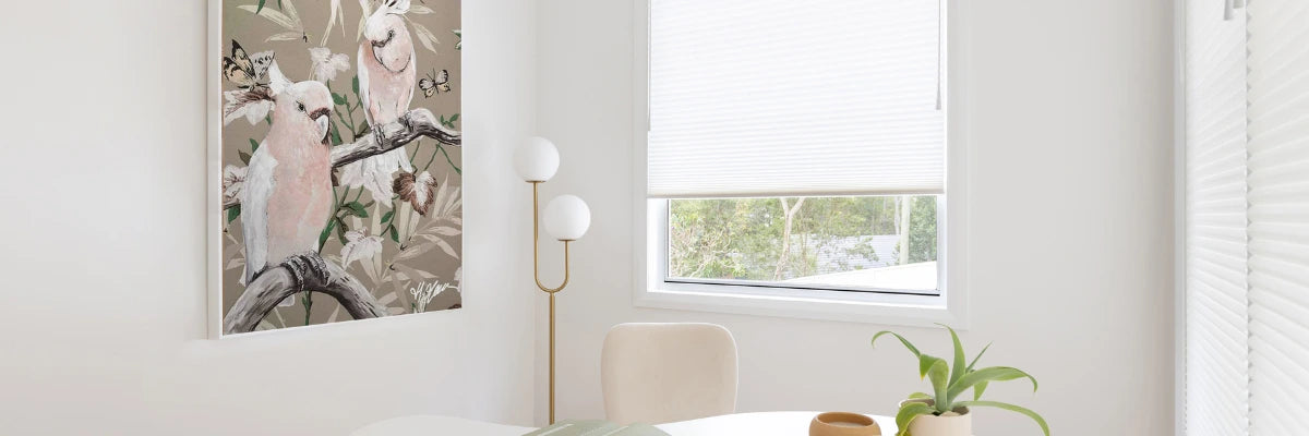 Light-filled contemporary room featuring charming animal-themed art, showcasing Australian cockatoos in soft pastel tones.