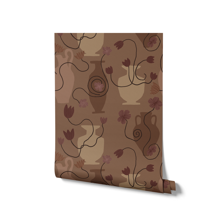 Deep brown wallpaper design with soft beige and rust vases, trailing plum-toned flowers, and moody undertones, from the Shatha collection with Urban Road.