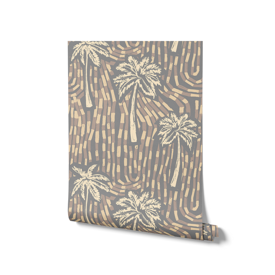 Warm ivory wallpaper with sandy beige palm trees layered over a cool-toned geometric dash pattern, from the Shatha collection with Urban Road.