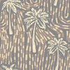 Warm ivory wallpaper with sandy beige palm trees layered over a cool-toned geometric dash pattern, from the Shatha collection with Urban Road.