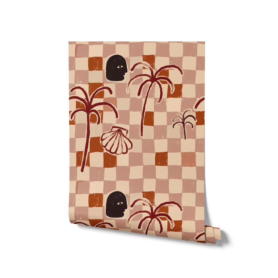 Olive green wallpaper with hand-drawn checkered background, contrasting brown palms, and stylised face and shell details, from the Shatha collection with Urban Road.