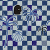 Deep blue checkered wallpaper with cream and cobalt elements, layered with palms, shells, and an illustrated black face profile, from the Shatha collection with Urban Road.