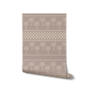 Clay-toned wallpaper featuring hand-drawn palm trees in horizontal rows, bordered with dotted and checkered bands, from the Shatha collection with Urban Road.