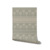 Sage green wallpaper with minimalist palm motifs and alternating checkered and striped bands, from the Shatha collection with Urban Road.