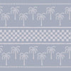 Denim blue wallpaper with off-white palm tree silhouettes and soft stripe detailing in horizontal layers, from the Shatha collection with Urban Road.