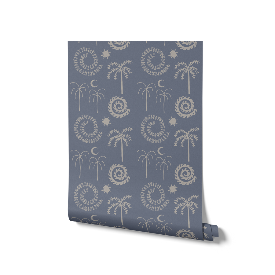 Warm brown wallpaper with tonal botanical and celestial motifs including stylised palms, stars, and spirals, from the Shatha collection with Urban Road.