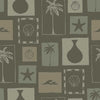 Dark green wallpaper with soft sage-framed tropical motifs—palms, sea elements, and ceramics—in a vintage-style layout, from the Shatha collection with Urban Road.