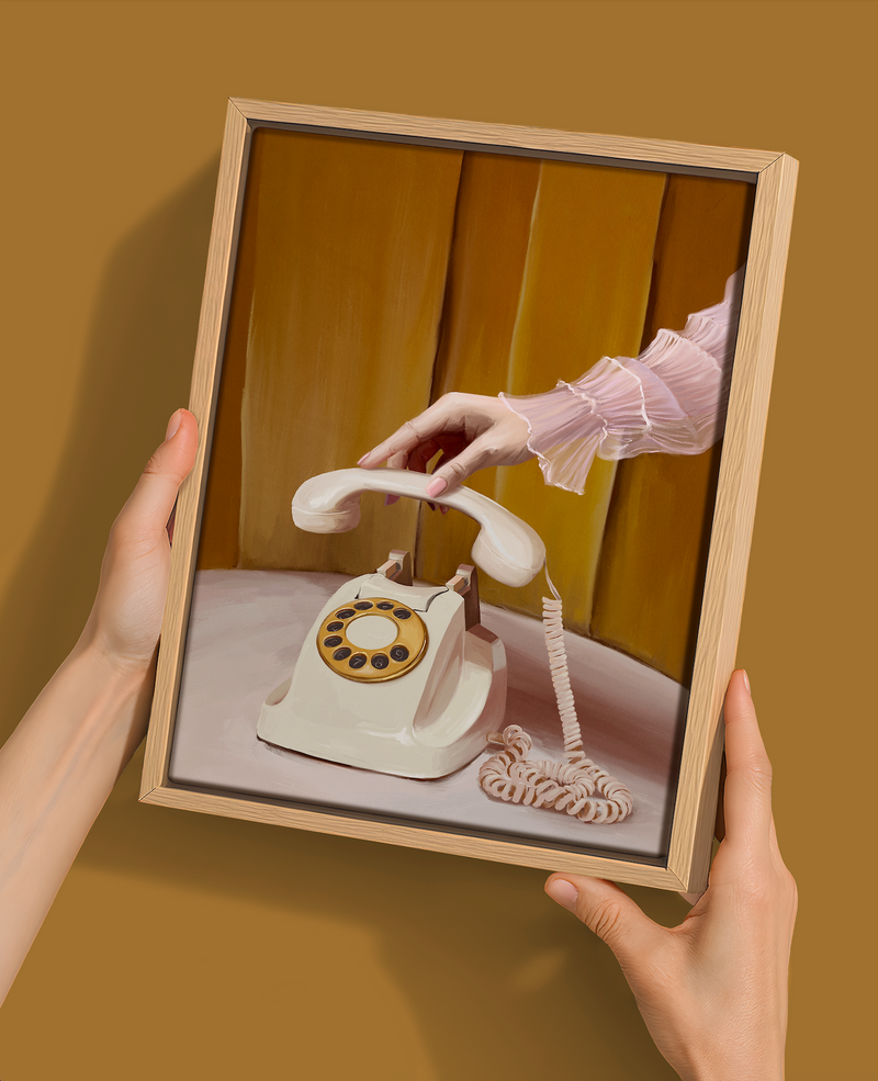 A person holds the "Out Of Office" Oak Box Frame Canvas (22.5x30, Portrait) by Shaynna Blaze x Urban Road, featuring a hand lifting a vintage rotary phone—ideal as retro-chic decor or collectible wall art.