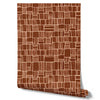 Wallpaper from the Tim Neve collection by Urban Road, showcasing terracotta grid patterns with a soft, organic feel against a warm beige base.