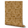 Wallpaper from the Tim Neve collection by Urban Road, featuring golden ochre grids with soft brown contrasts, creating a warm, natural aesthetic.