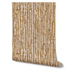 Wallpaper from the Tim Neve collection by Urban Road, with rich golden bark patterns layered over warm brown textures for an earthy, organic design.