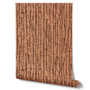 Wallpaper from the Tim Neve collection by Urban Road, showcasing a peachy woodgrain pattern with layered organic lines and soft brown accents.