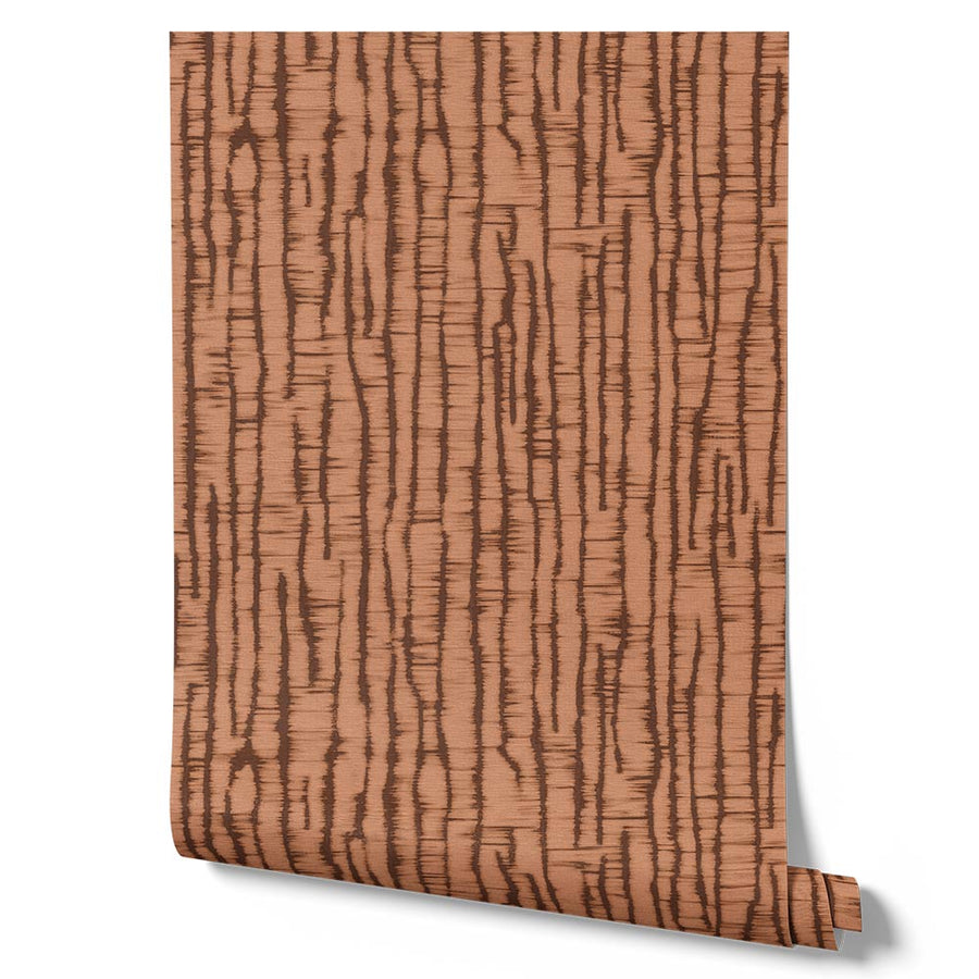 Wallpaper from the Tim Neve collection by Urban Road, showcasing a peachy woodgrain pattern with layered organic lines and soft brown accents.