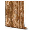 Wallpaper from the Tim Neve collection by Urban Road, with a cinnamon woodgrain design and bold organic lines, creating a rustic, natural feel.