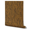 Wallpaper from the Tim Neve collection by Urban Road, combining black bark patterns with golden accents for a striking, modern contrast.