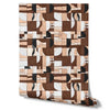 Wallpaper from the Tim Neve collection by Urban Road, featuring chocolate and cream abstract shapes in a bold graphic pattern.