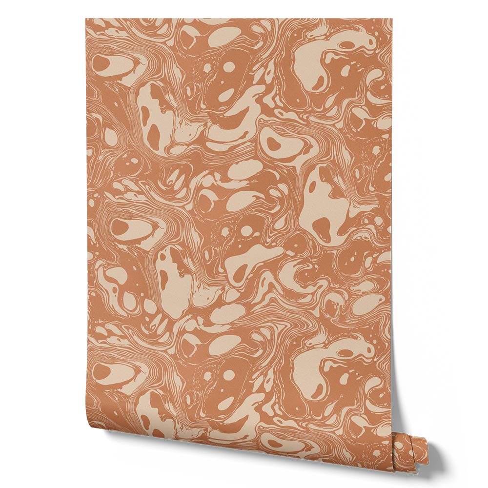 Wallpaper from the Tim Neve collection by Urban Road, featuring peach marbling and soft swirling shapes for a warm abstract aesthetic.