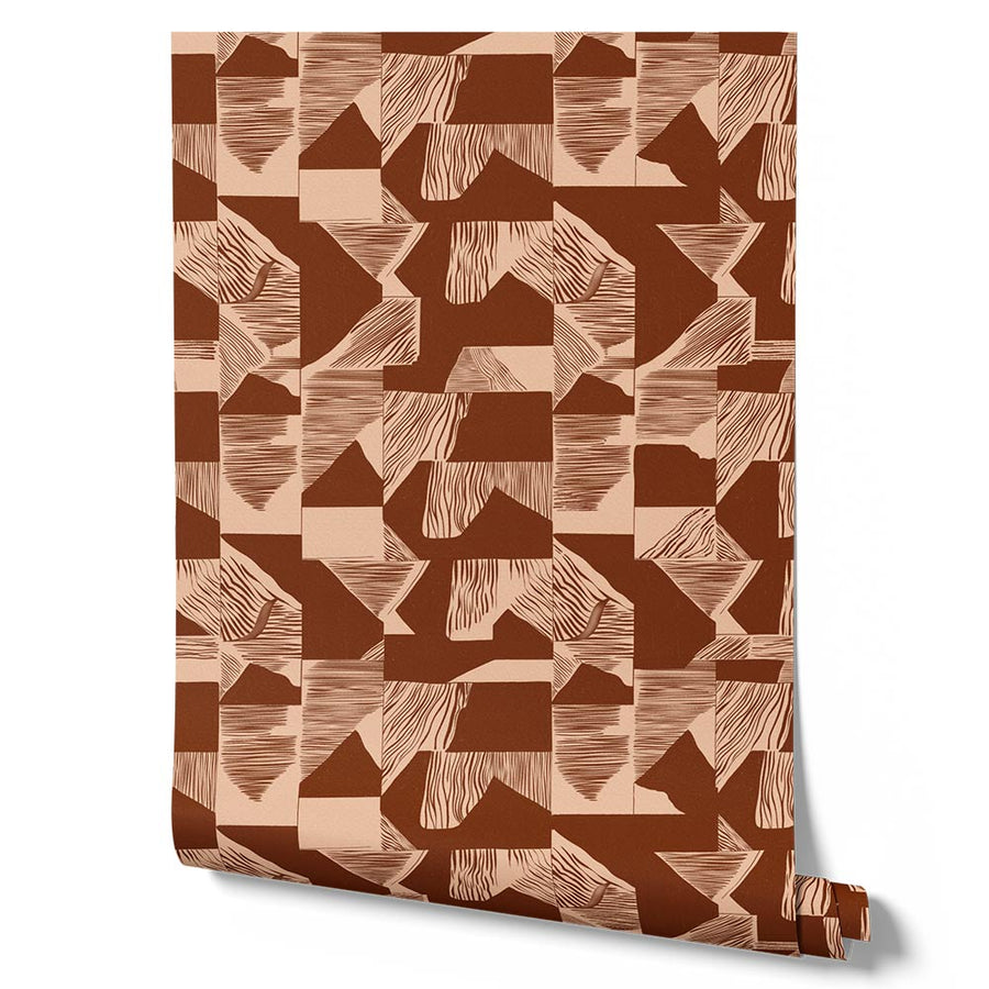 Wallpaper from the Tim Neve collection by Urban Road, with terracotta grid patterns layered over warm brown textures.