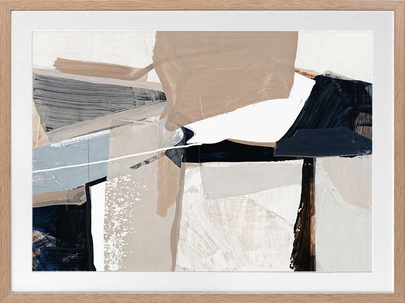 A framed Equilibrium I art print hanging in a modern living space. The artwork features bold brushstrokes in navy, beige, and white, styled with a textured armchairs and neutral decor.