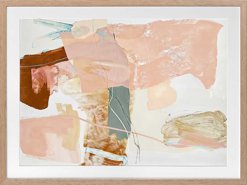 A framed Floating On Air I art print displayed in a lighter toned living space with a white bench, a soft white rug, flowy sheer curtains, and cosy decor.