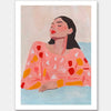 A modern portrait art print titled Carmela, featuring a woman in warm coral, red, and beige hues with confident brushstrokes, embodying strength and elegance.