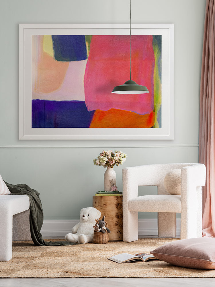 Neon Dreams abstract artwork adds bold colour above a neutral armchair and checkered rug in a soft pink and timber setting.