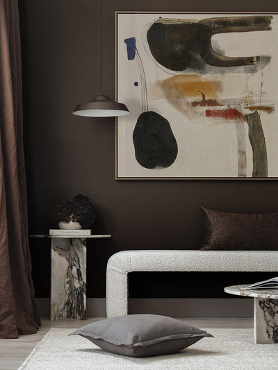 Homebound II artwork styled in a contemporary bedroom with dark brown drapes, monochrome furniture and layered cushions.