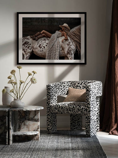 Horses Are a Girl’s Best Friend art print above neutral decor in a rich, chocolate-toned room with soft linens and florals.