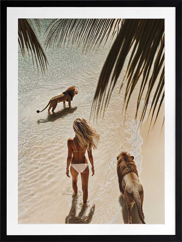 Photographic wall art of a woman and lions walking on a tropical beach with palm leaves, depicting adventurous strength.