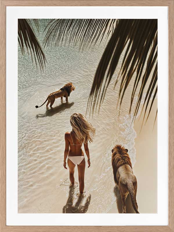 Photographic wall art of a woman and lions walking on a tropical beach with palm leaves, depicting adventurous strength.