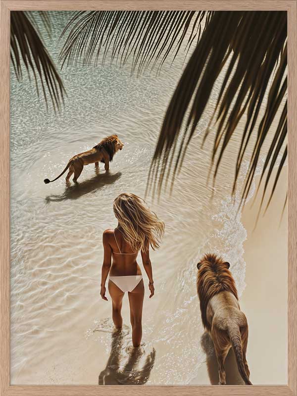 Photographic wall art of a woman and lions walking on a tropical beach with palm leaves, depicting adventurous strength.