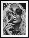 Black-and-white photographic portrait artwork of a glamorous woman smoking, celebrating fearless femininity.