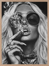 Black-and-white photographic portrait artwork of a glamorous woman smoking, celebrating fearless femininity.