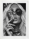 Black-and-white photographic portrait artwork of a glamorous woman smoking, celebrating fearless femininity.
