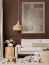 Nostalgic Mood II abstract wall art styled with a dusty rose armchair, neutral pendant light, and wood side table.