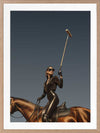 Photographic wall art of a glamorous woman polo player on horseback capturing equestrian style in sophisticated tones.