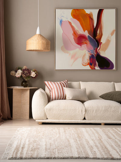 Fleeting Florals I flower art print in a soft neutral space with a cream sofa, pendant light, and warm neutral accents.