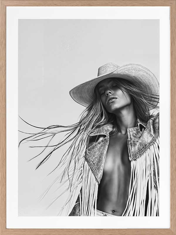 Monochrome photographic portrait artwork featuring a woman wearing a fringe jacket and cowboy hat, expressing bold freedom.