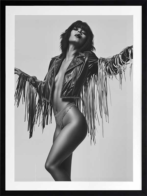 Dynamic monochrome photographic portrait of a stylish woman in motion wearing a fringe jacket, conveying carefree confidence.