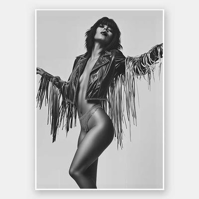 Dynamic monochrome photographic portrait of a stylish woman in motion wearing a fringe jacket, conveying carefree confidence.