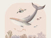 A large illustrated whale and a small turtle swim side by side through soft coral and ocean life in pastel pink and grey tones, from the Little Tails Collection by Urban Road.