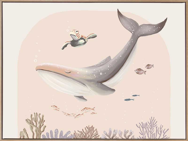A large illustrated whale and a small turtle swim side by side through soft coral and ocean life in pastel pink and grey tones, from the Little Tails Collection by Urban Road.