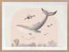 A large illustrated whale and a small turtle swim side by side through soft coral and ocean life in pastel pink and grey tones, from the Little Tails Collection by Urban Road.