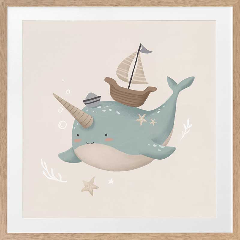 A cheerful blue narwhal wearing a captain’s hat with a tiny boat and bubbles around, in soft neutral tones, from the Little Tails Collection by Urban Road.