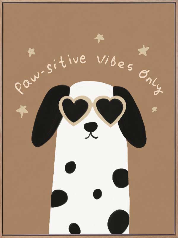 Smiling dalmatian pup with heart sunglasses and a “pawsitive vibes only” slogan on a warm brown background, from the Little Tails Collection by Urban Road.