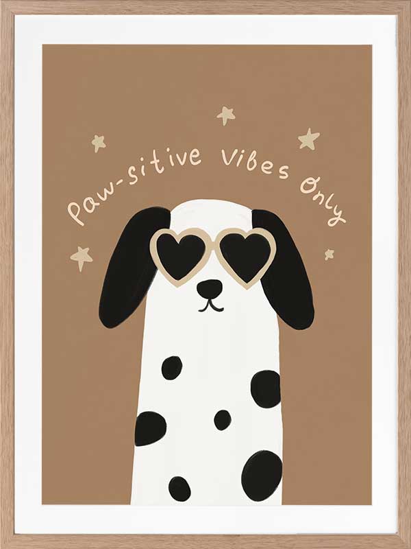 Smiling dalmatian pup with heart sunglasses and a “pawsitive vibes only” slogan on a warm brown background, from the Little Tails Collection by Urban Road.